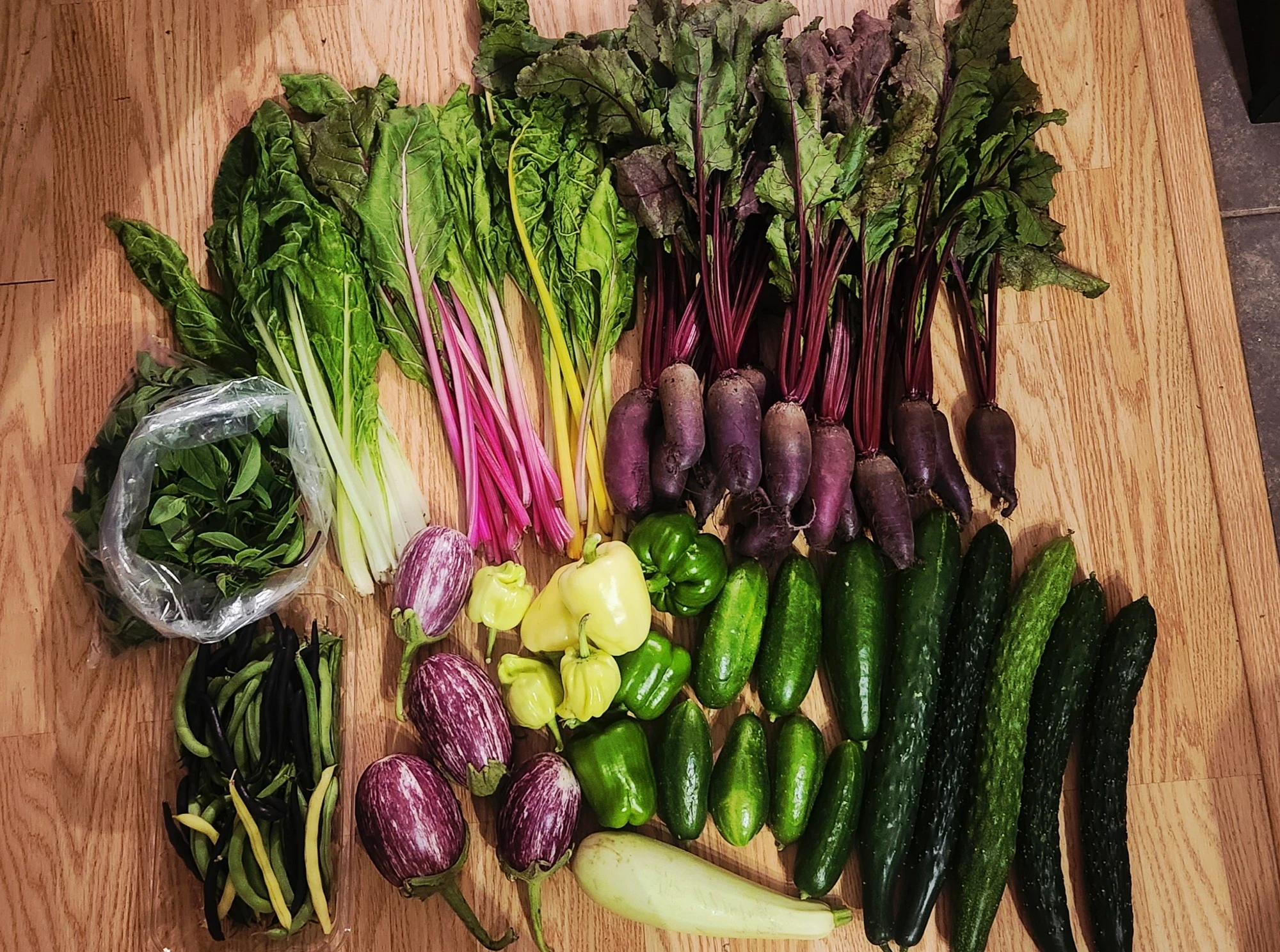 A single morning's harvest laid out on the farm table